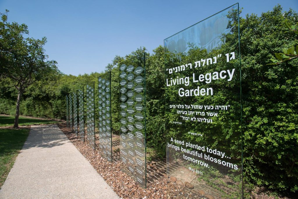 The names of Living Legacy Society members are displayed on “leaves” on the glass walls in the Living Legacy Garden