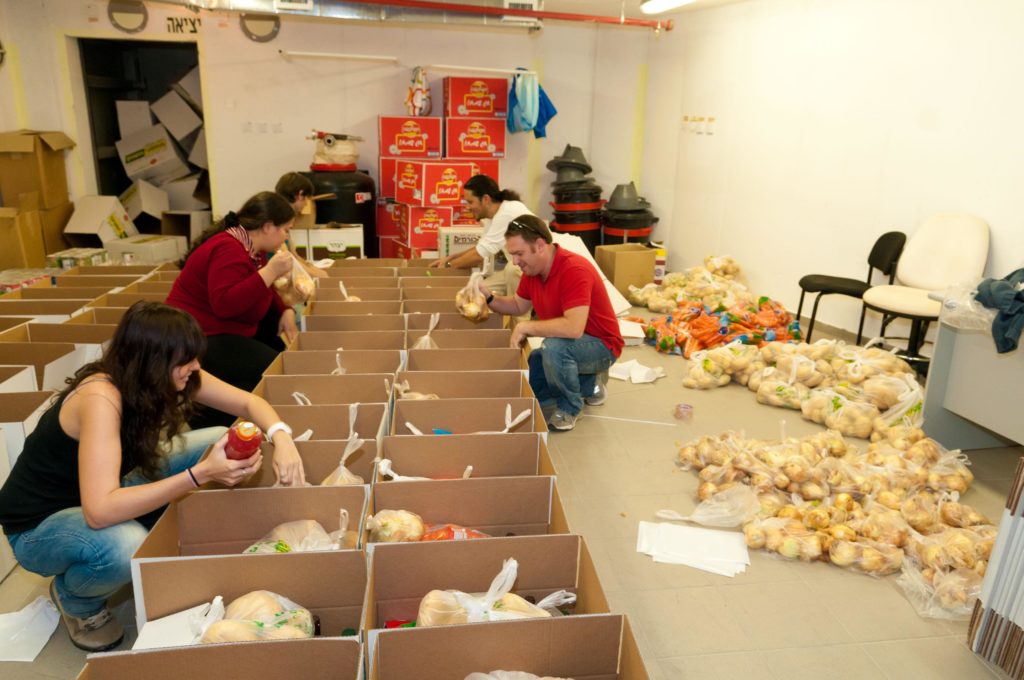 The BGU students association and security personnel joined forces to assemble food packages for the needy for Passover. The money for the food was raised through a “Lost and Found” sale that raised over $4,600 (16,000 shekels).
