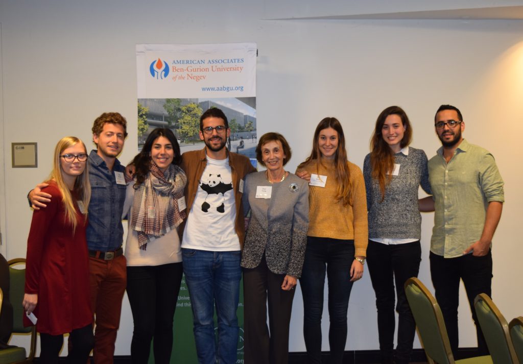 Students from the 2016 iGEM team created a revolutionary project, PlastiCure, which eliminates harmful environmental waste in the form of plastic bottles. Pictured left to right: Inbar Segal, Dor Bar-On, Tomer Shary, Nir Zafrany, Noa Weiss, Efrat Jeshurun, Guy Farjon with Americans for Ben-Gurion University President, Toni Young (center).