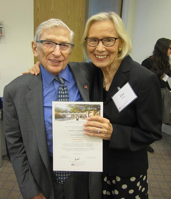 Arnold Sabin with his wife Region Chair Lite Sabin proudly holding their new Americans for Ben-Gurion University Asarot Society certificate.